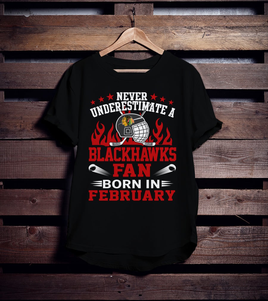 Never Underestimate A Blackhawks Fan Born In February Hockey Helmet Flame Logo Stars T-Shirt