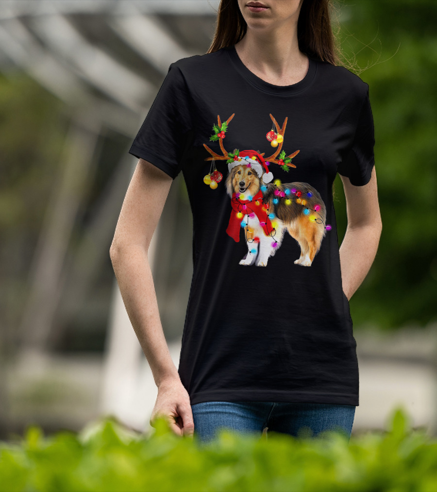 Christmas Sheltie Dog In Santa Hat With Reindeer Antlers And Colorful String Lights T-Shirt