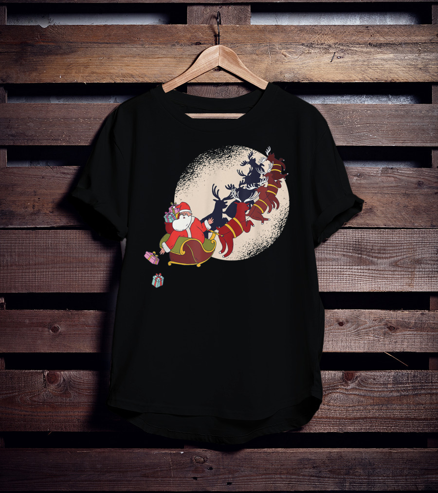 Santa Claus Flying With Reindeers Silhouette Under Full Moon Carrying Gift Sack T-Shirt