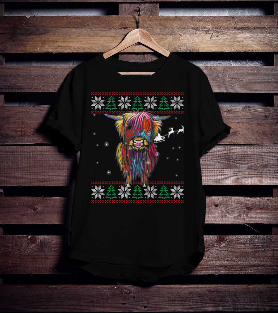 Festive Rainbow Highland Cow With Santa Sleigh And Snowflakes Christmas T-Shirt