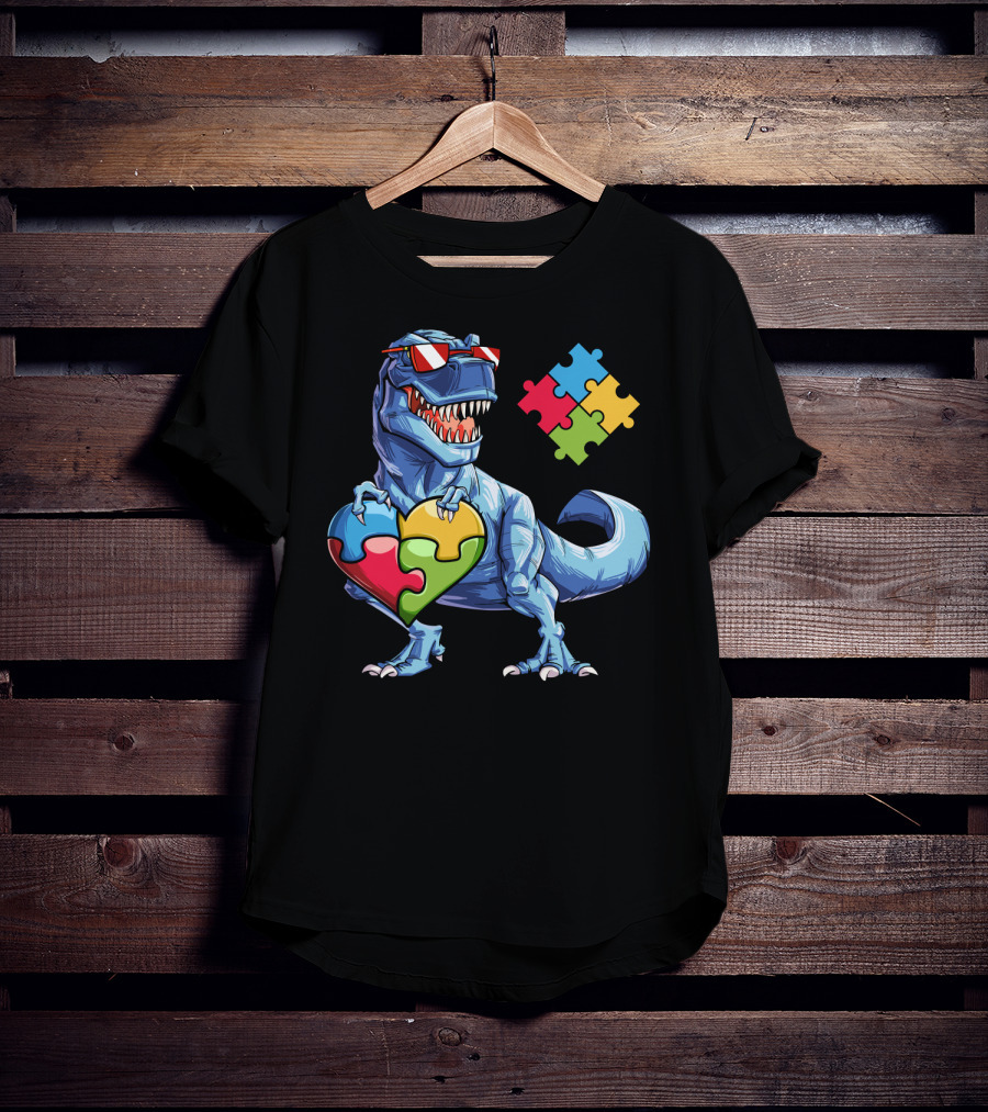 Dinosaur Holding Heart-Shaped Puzzle Pieces Autism Awareness T-Shirt