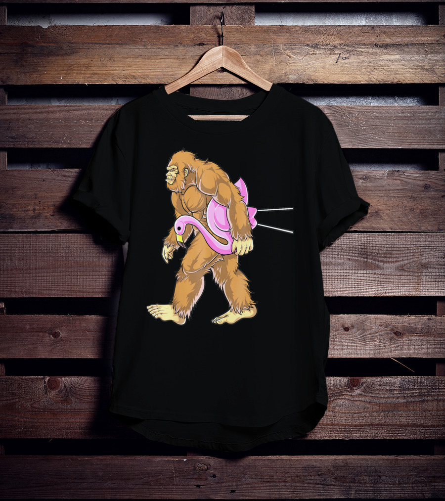 Bigfoot Carrying Pink Lawn Flamingo Humorous Sasquatch Image T-Shirt
