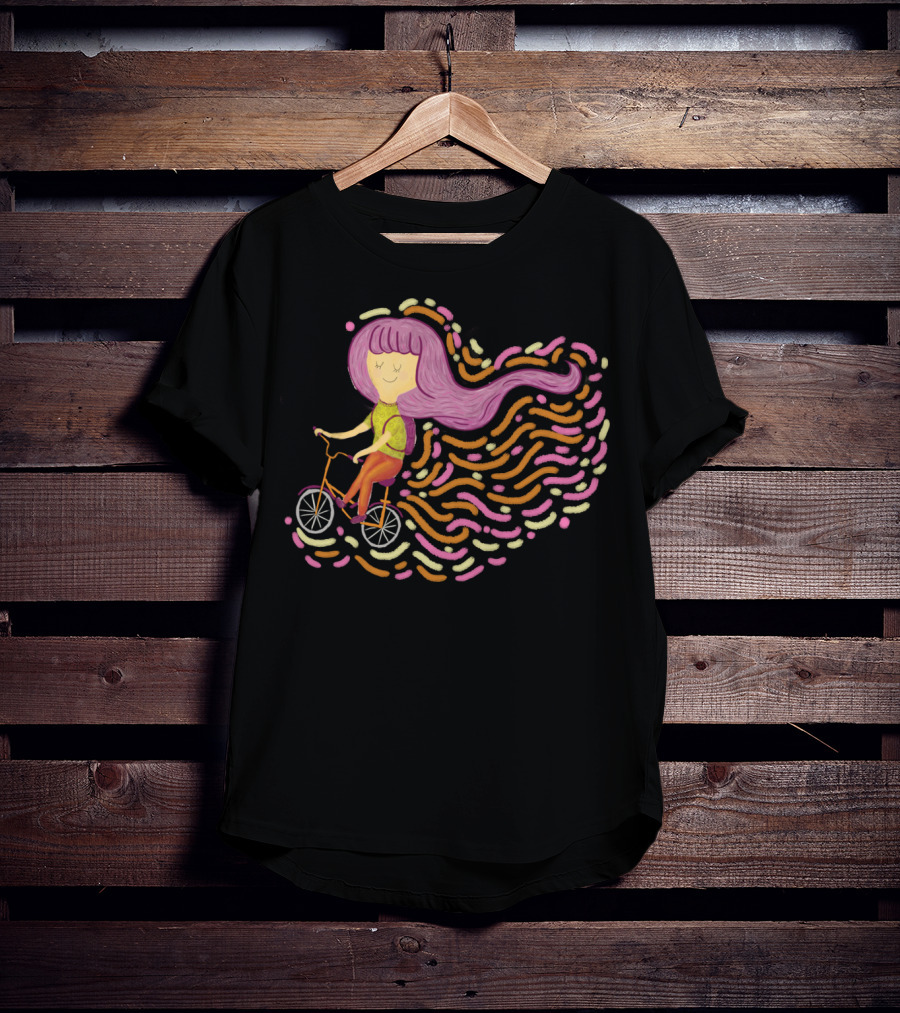 Claire Riding Bicycle With Flowing Pink Hair And Colorful Trails T-Shirt