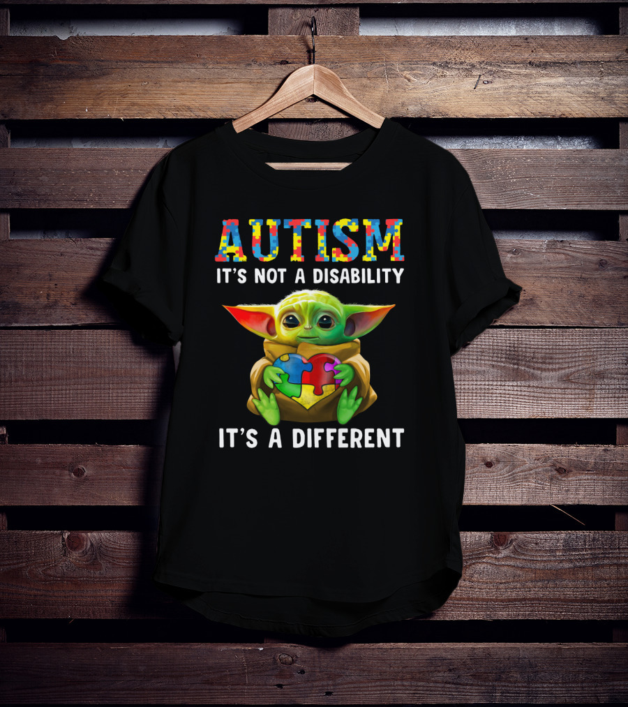 AUTISM IT'S NOT A DISABILITY IT'S A DIFFERENT Baby Yoda Holding Puzzle Piece T-Shirt