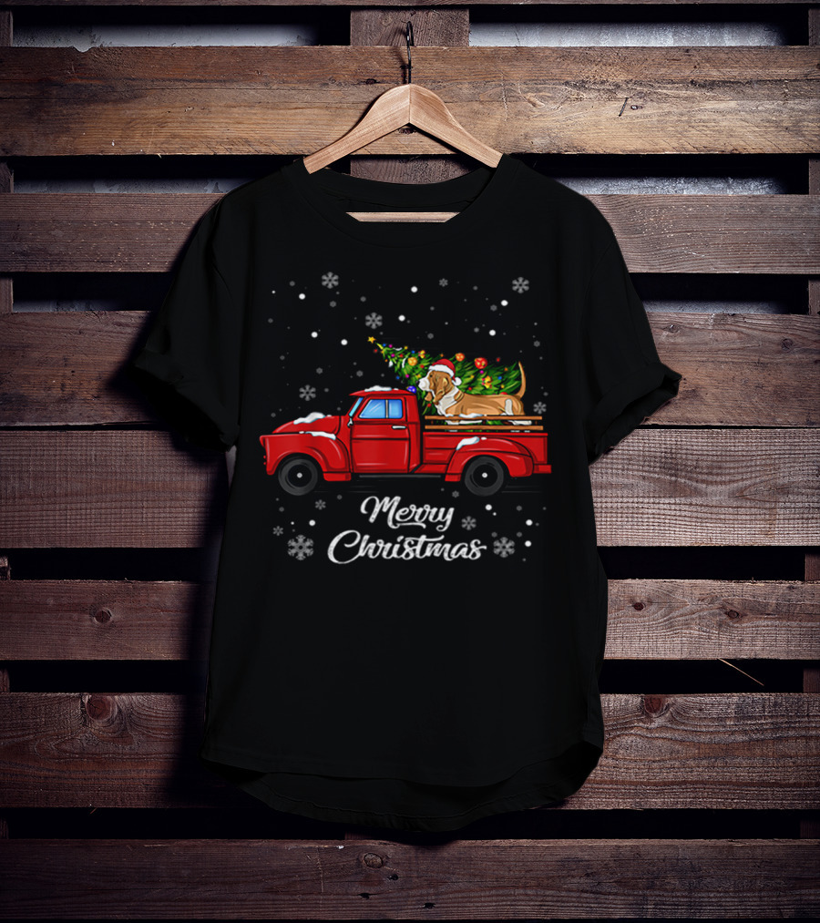 Merry Christmas Basset Hound With Santa Hat On Red Truck With Christmas Tree And Snowflakes T-Shirt