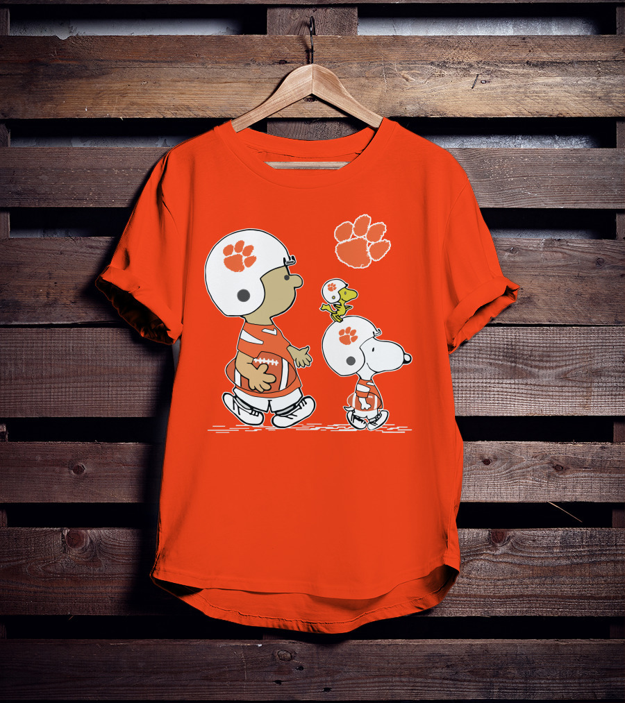 Clemson Tigers Snoopy Football Helmets And Paw Print Charlie Brown Woodstock T-Shirt