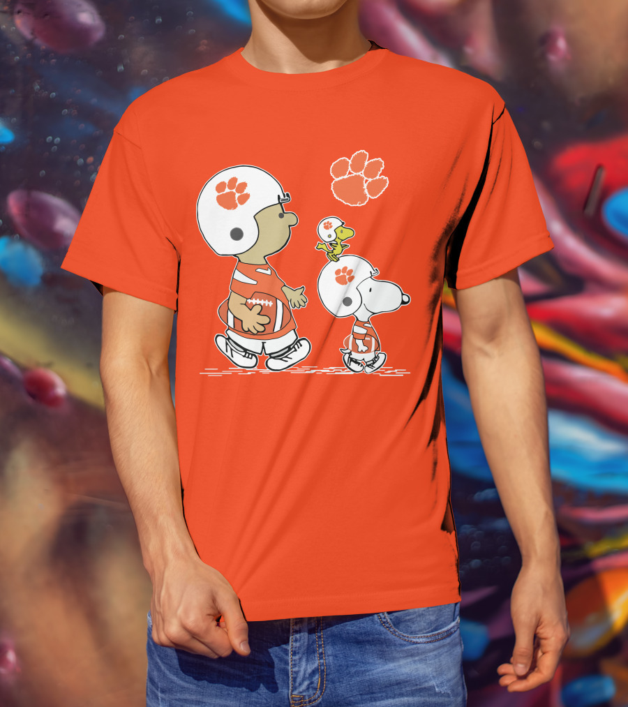Clemson Tigers Snoopy Football Helmets And Paw Print Charlie Brown Woodstock T-Shirt