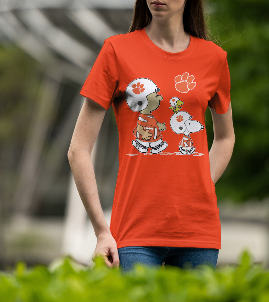 Clemson Tigers Snoopy Football Helmets And Paw Print Charlie Brown Woodstock T-Shirt