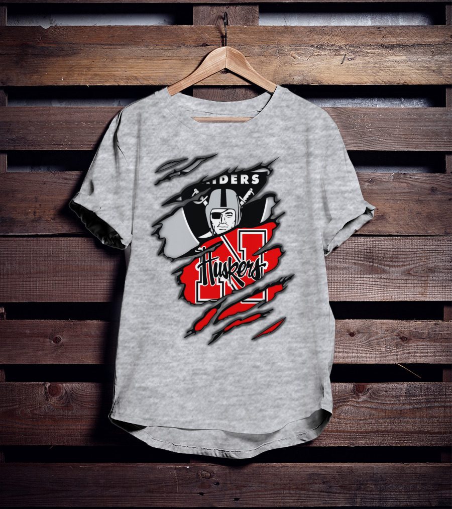 Raiders Huskers Torn Design With Icons And Symbols T-Shirt