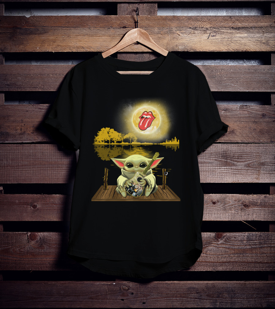 The Rolling Stones Tongue Logo And Baby Yoda With Guitar Under Moonlit Sky Trees And Lake Reflection T-Shirt