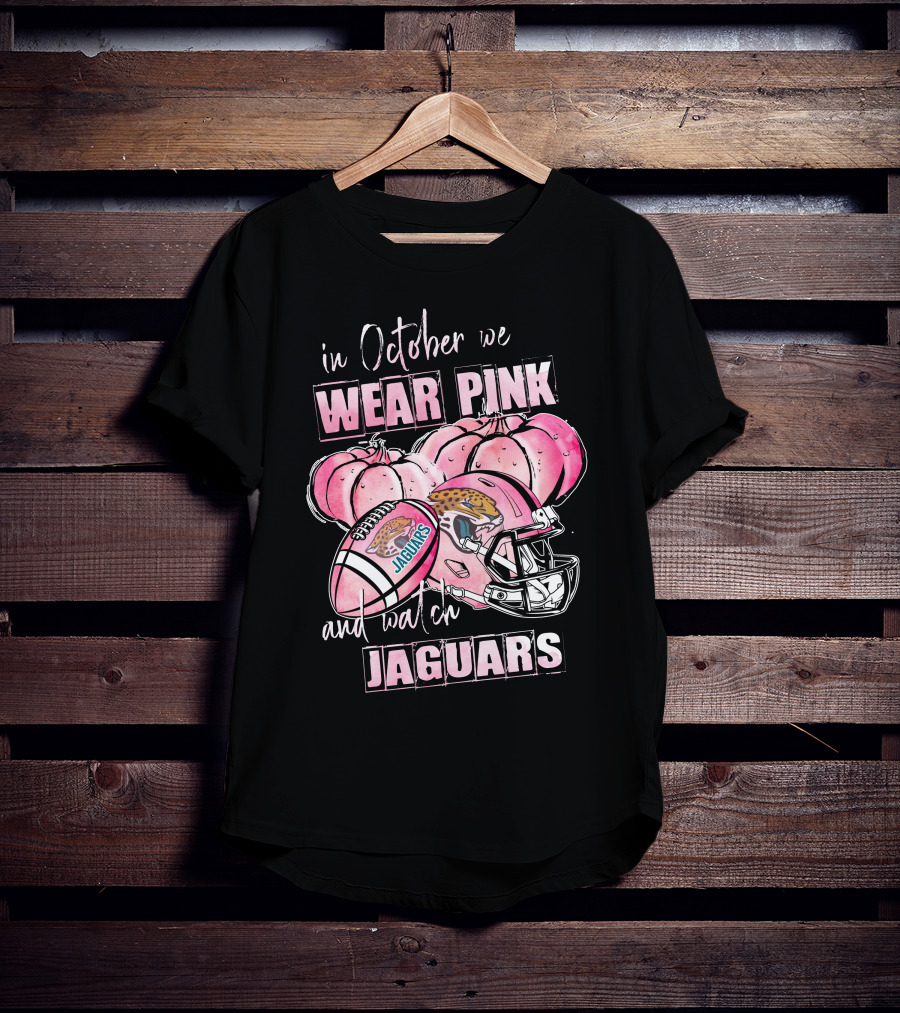 In October We Wear Pink And Watch Jaguars Football Helmet Pumpkins T-Shirt
