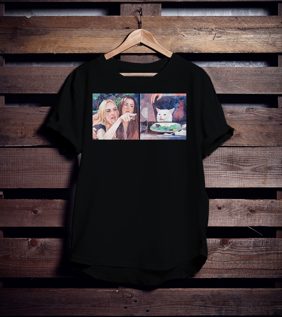 Angry Women Pointing At Indifferent Cat Sitting At Dining Table T-Shirt
