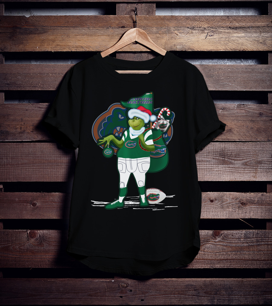 Grinchxmas Wearing Santa Hat Florida Gators With Gator Logo And Candy Cane T-Shirt