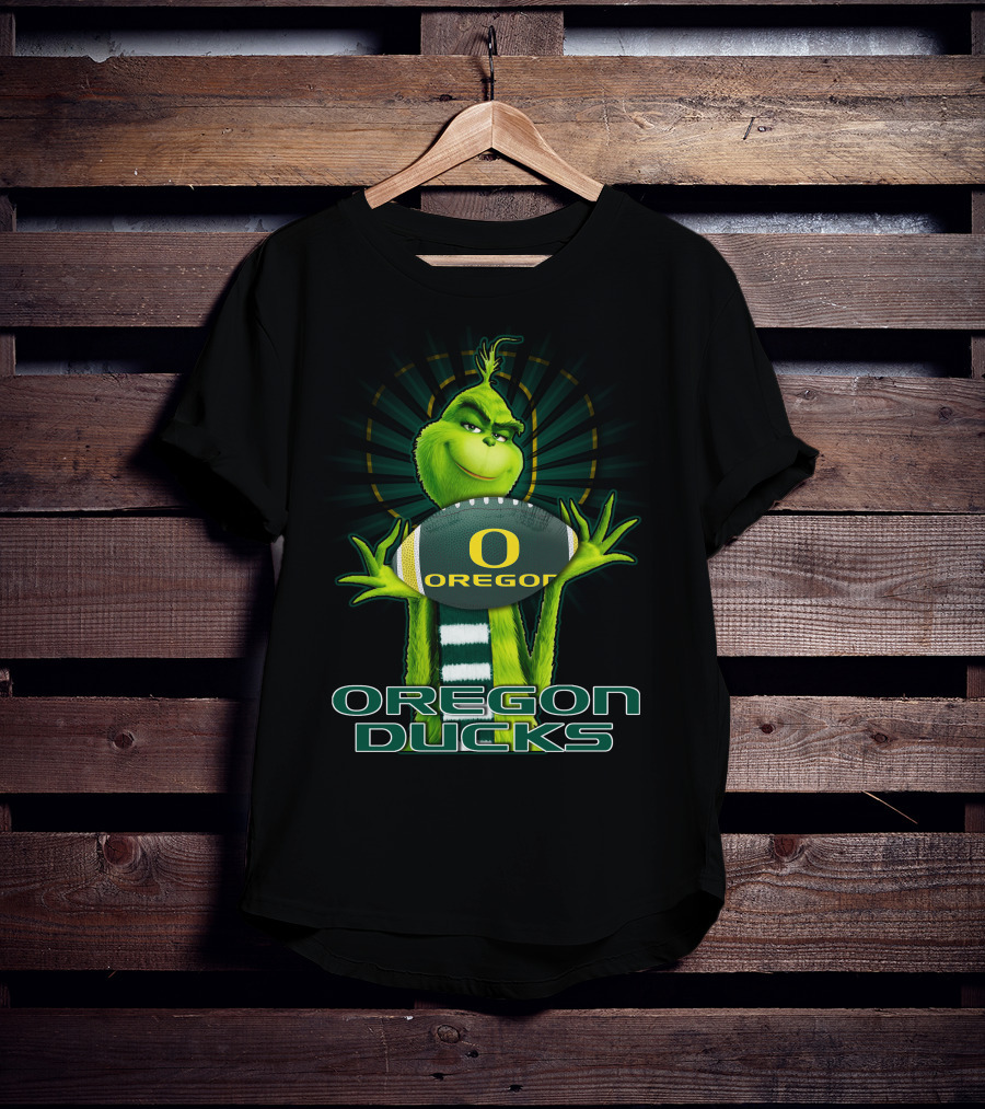 Grinch Holding Oregon Ducks Football T-Shirt