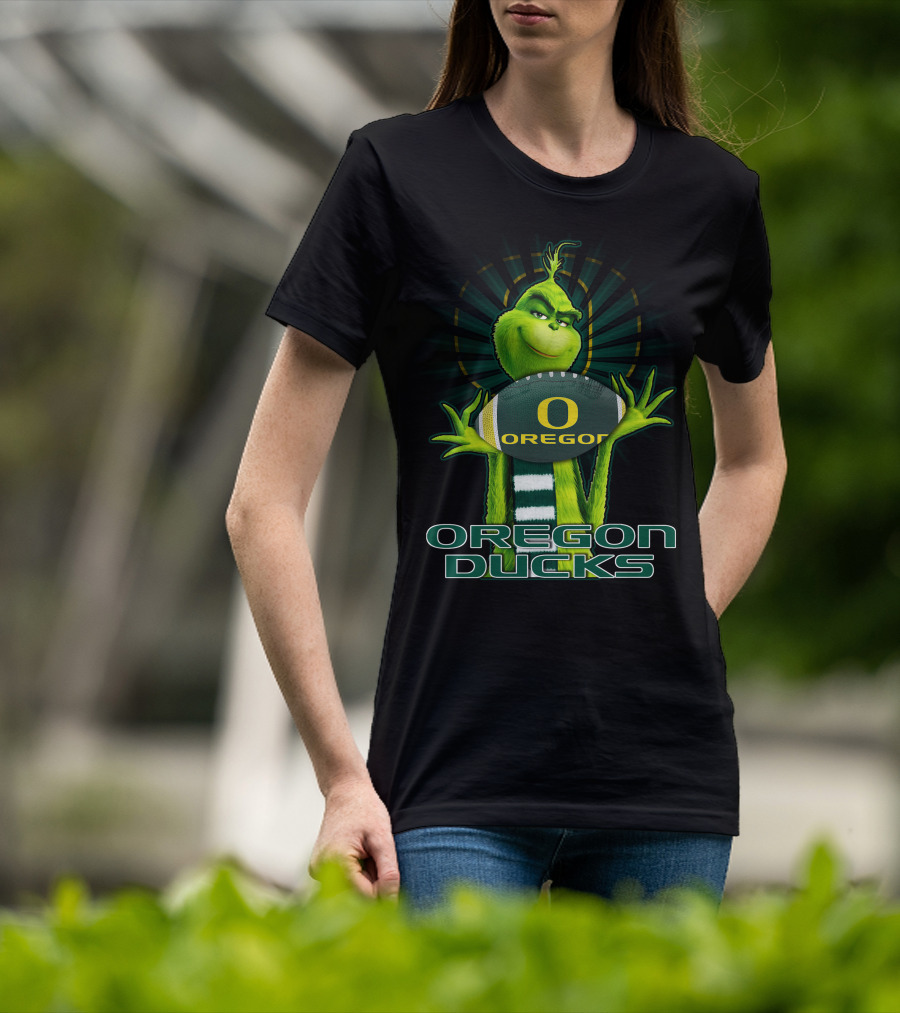 Grinch Holding Oregon Ducks Football T-Shirt
