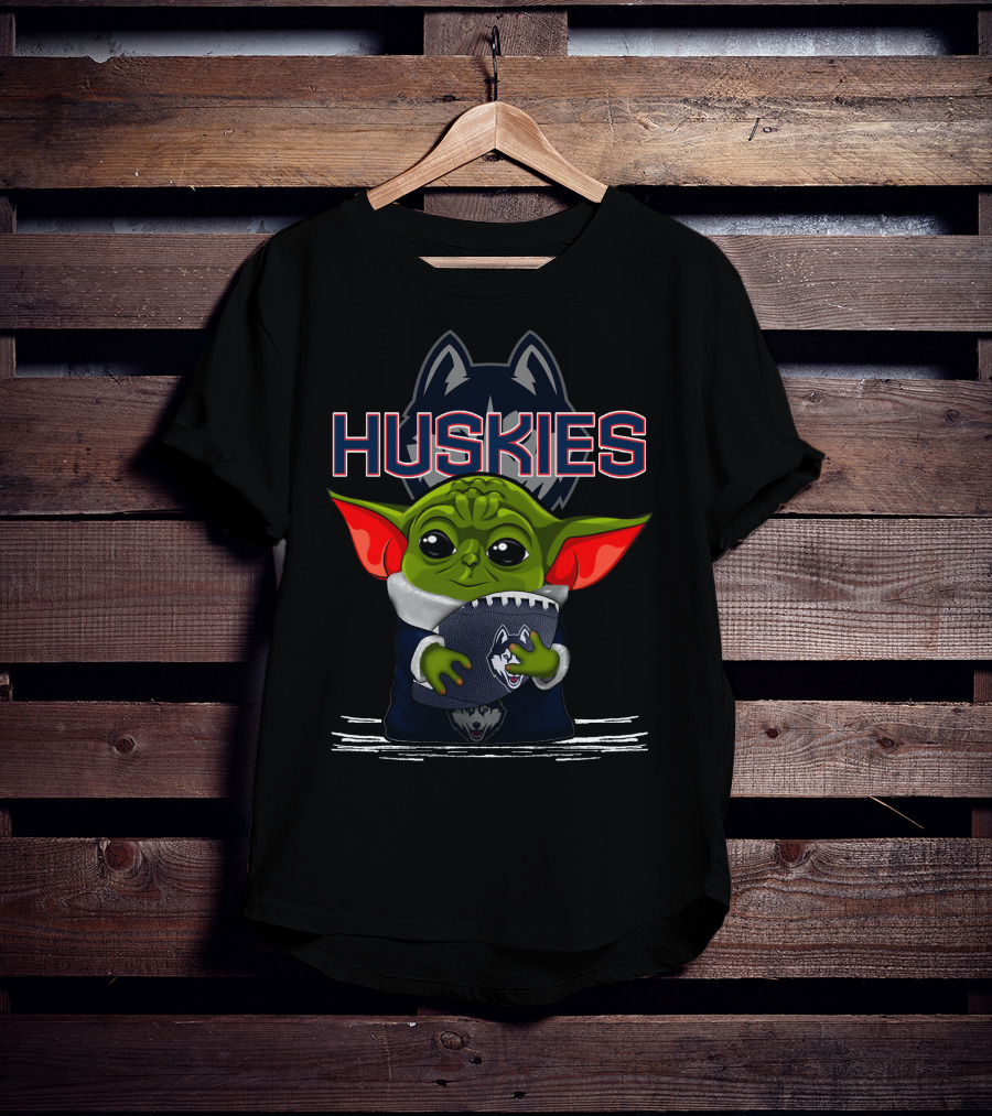 Huskies Yoda Holding Football With Connecticut Logo And Baby Yoda Character T-Shirt