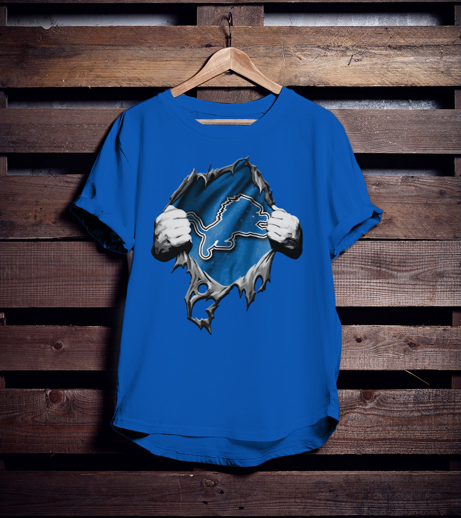Torn Skin Revealing Detroit Lions Emblem On Blue T-Shirt