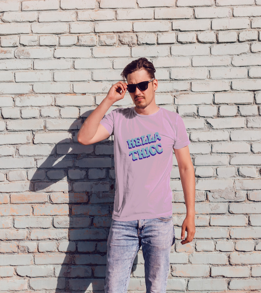 HELLA THICC Bold Text On Pink Background T-Shirt