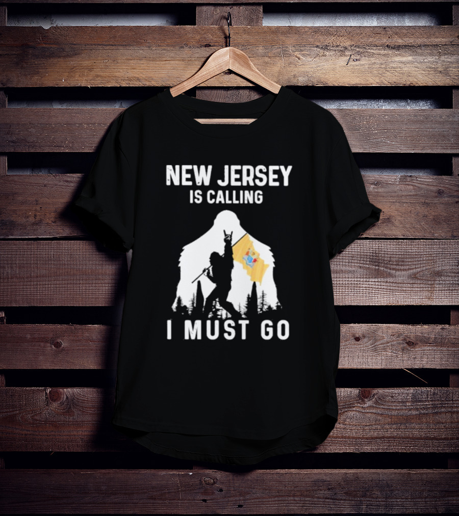 New Jersey Is Calling I Must Go Bigfoot Holding New Jersey Flag T-Shirt
