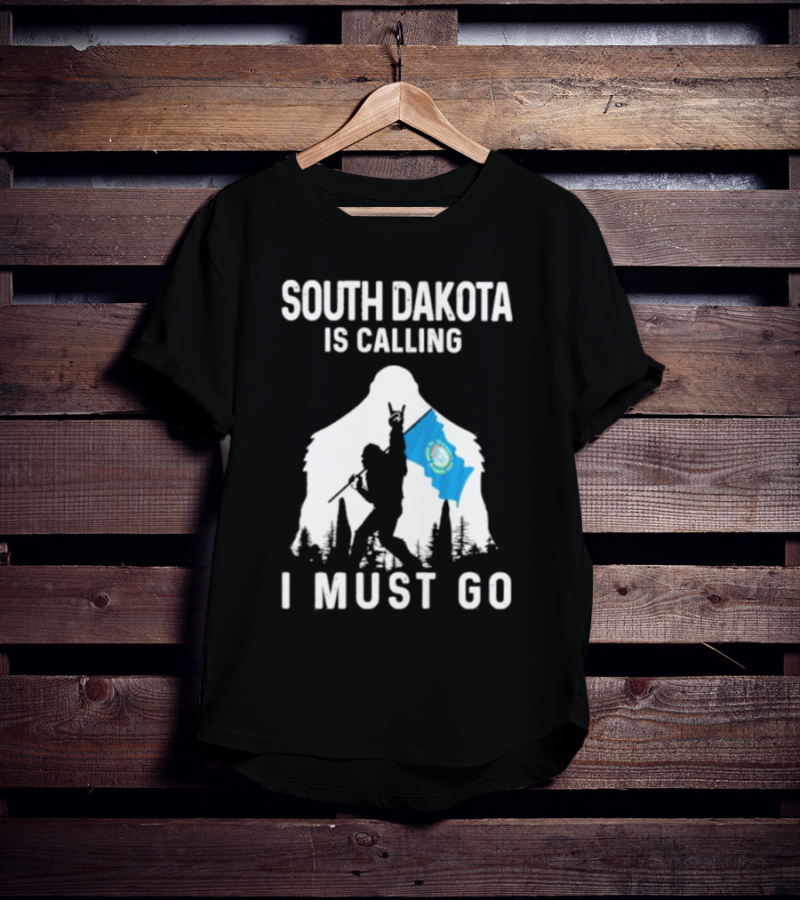 South Dakota Is Calling I Must Go Bigfoot Holding South Dakota Flag T-Shirt