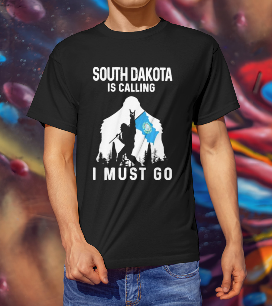 South Dakota Is Calling I Must Go Bigfoot Holding South Dakota Flag T-Shirt