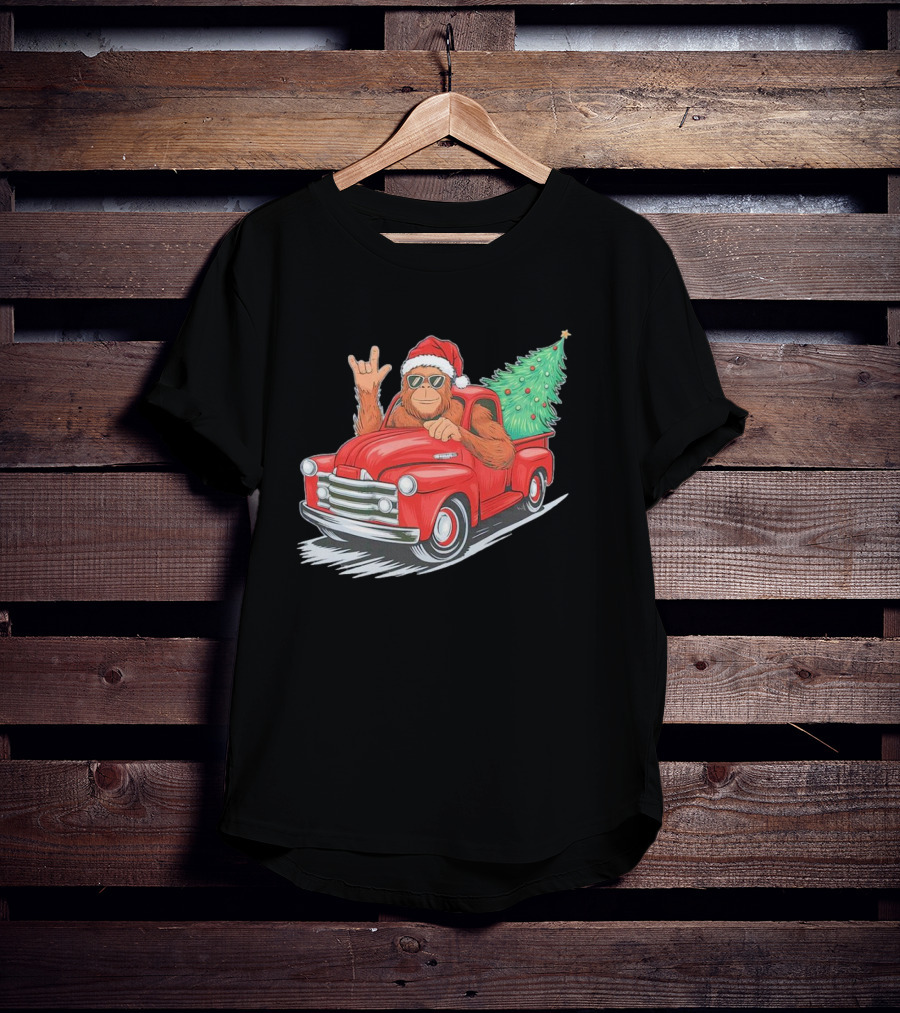 Bigfoot Rock On Santa Hat Christmas Tree Driving Red Truck T-Shirt