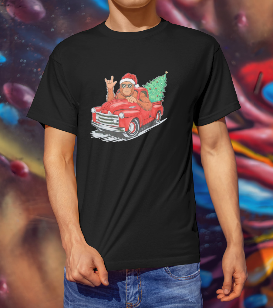 Bigfoot Rock On Santa Hat Christmas Tree Driving Red Truck T-Shirt