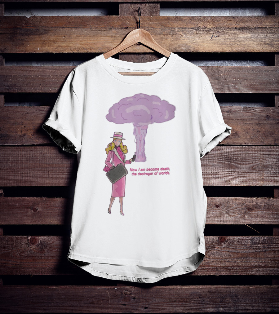 Now I Am Become Death The Destroyer Of Worlds Blonde Woman Pink Outfit Holding Bag Phone With Purple Mushroom Cloud T-Shirt