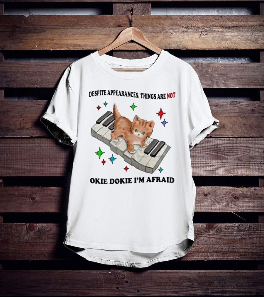 Despite Appearances Things Are Not Okie Dokie I'm Afraid Cat On Piano Keys With Colorful Stars T-Shirt