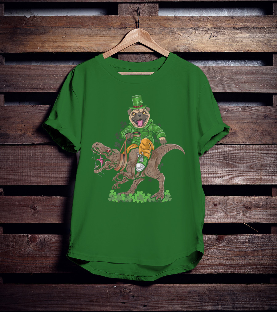 St Patricks Day Pug Puppy Riding Dinosaur Rex With Shamrocks And Leprechaun Hat T-Shirt