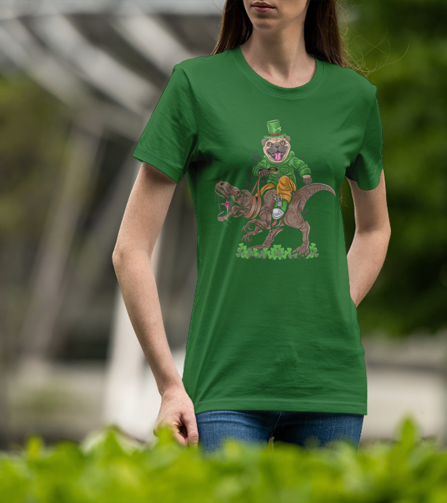 St Patricks Day Pug Puppy Riding Dinosaur Rex With Shamrocks And Leprechaun Hat T-Shirt