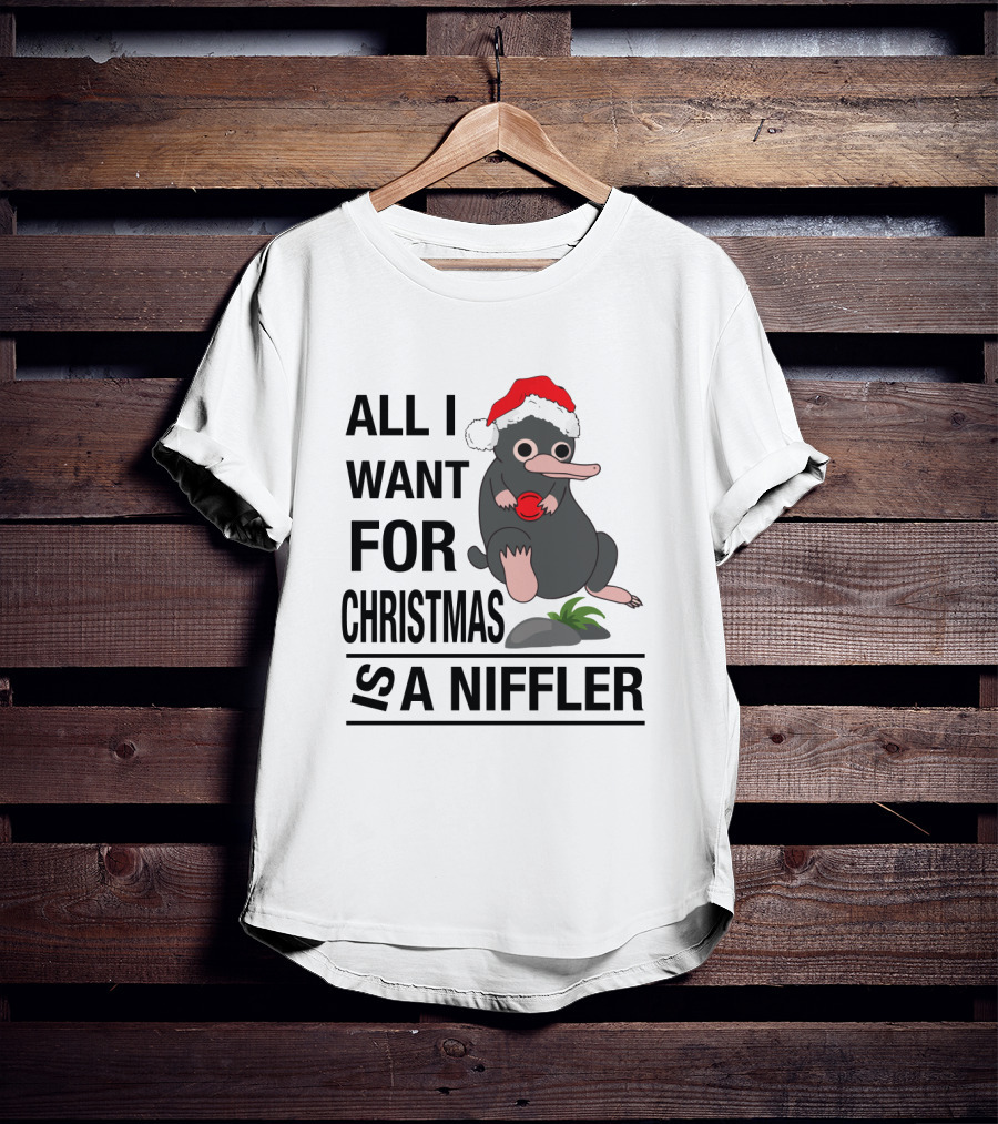 All I Want For Christmas Is A Niffler Wearing Santa Hat Holding Red T-Shirt