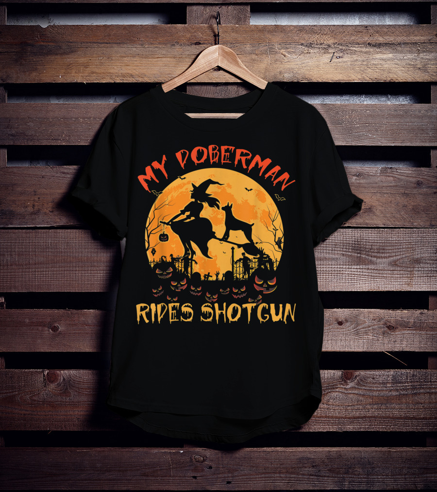 My Doberman Rides Shotgun Halloween Witch And Pumpkins Moon Scene T-Shirt