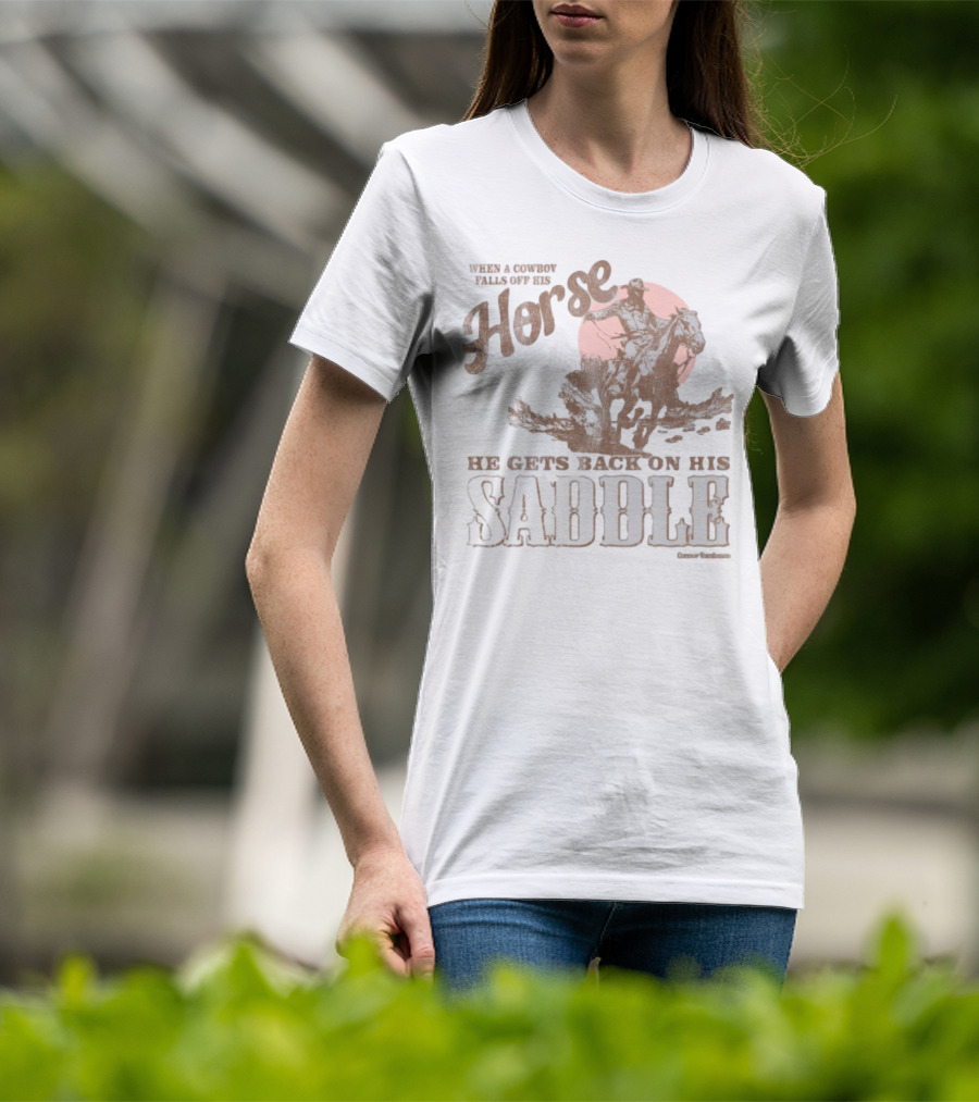 When A Cowboy Falls Off His Horse He Gets Back On His Saddle T-Shirt