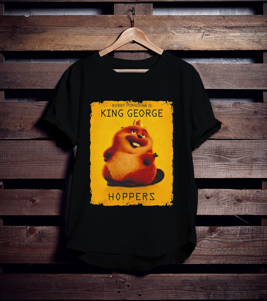 Bobby Moynihan Is King George Hoppers Smiling Cartoon Character With Crown On Orange T-Shirt