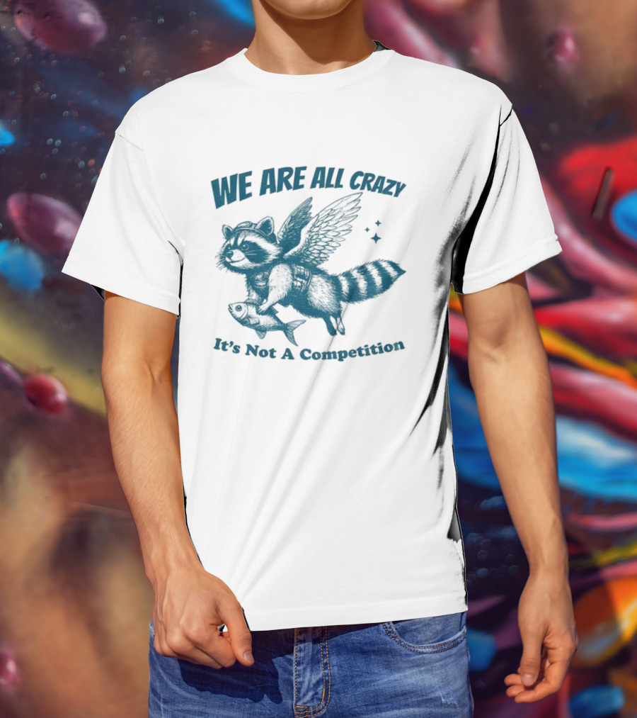 Raccoon With Wings Holding Fish We Are All Crazy It's Not A Competition T-Shirt
