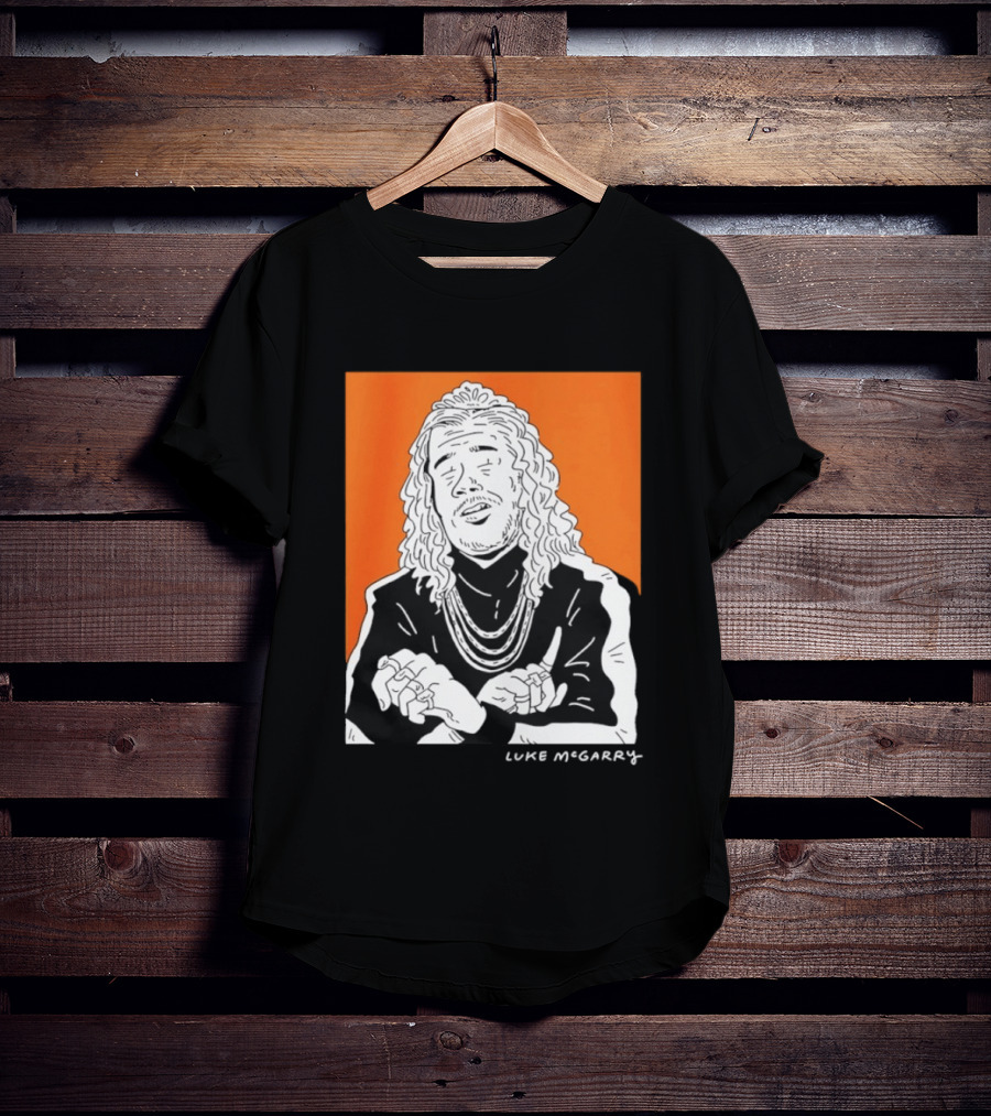 Luke McGarry Cartoon Character With Long Hair And Chains On Orange T-Shirt