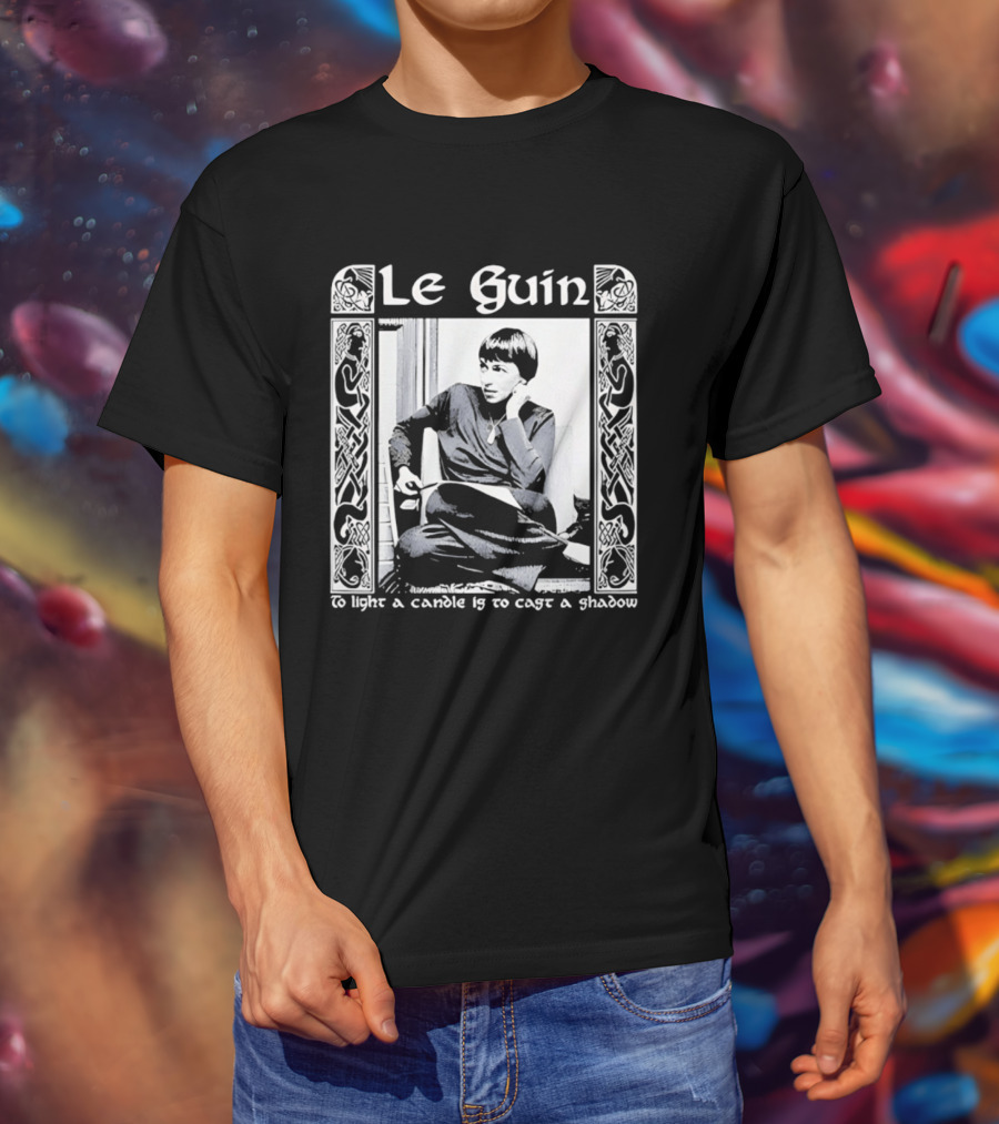 Le Guin To Light A Candle Is To Cast A Shadow T-Shirt