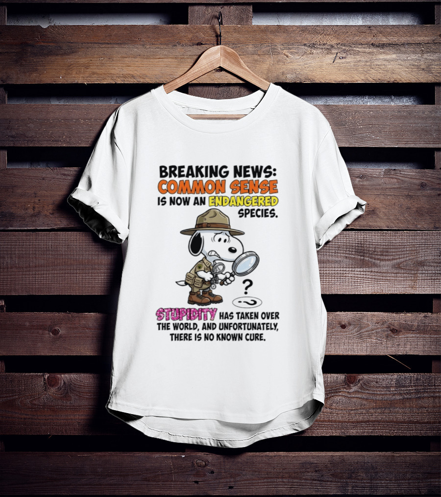 Breaking News Common Sense Endangered Species Stupidity Taken Over Snoopy T-Shirt