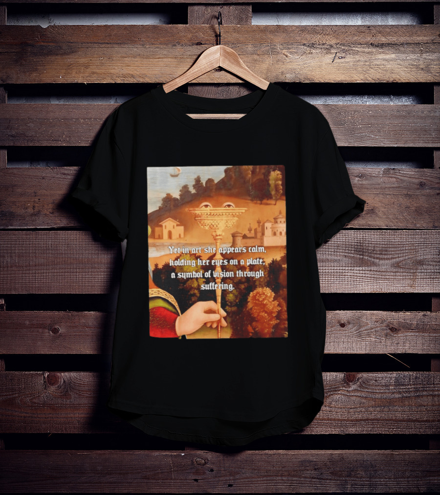 Yet In Art She Appears Calm Holding Her Eyes On A Plate A Symbol Of Vision Through Suffering T-Shirt