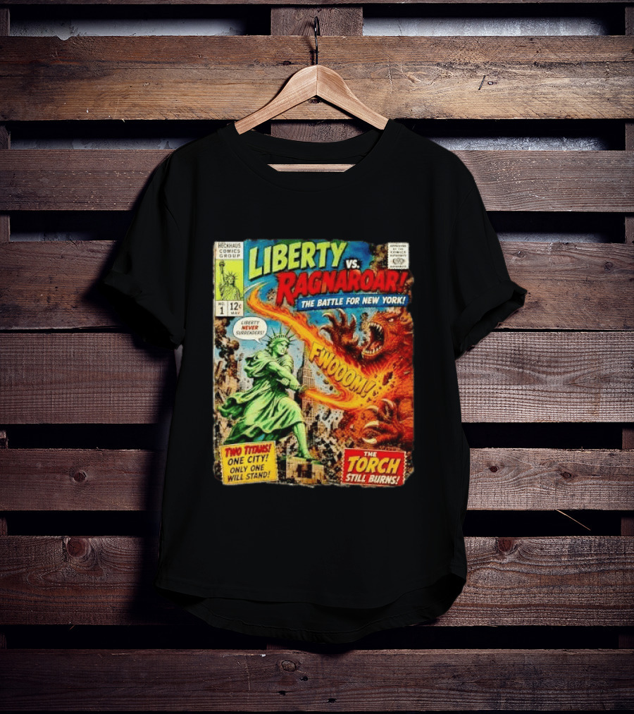 Heckhaus Comics Group Liberty Vs Ragnaroar The Battle For New York Fwooom Two Titans One City Only One Will Stand The Torch Still Burns T-Shirt