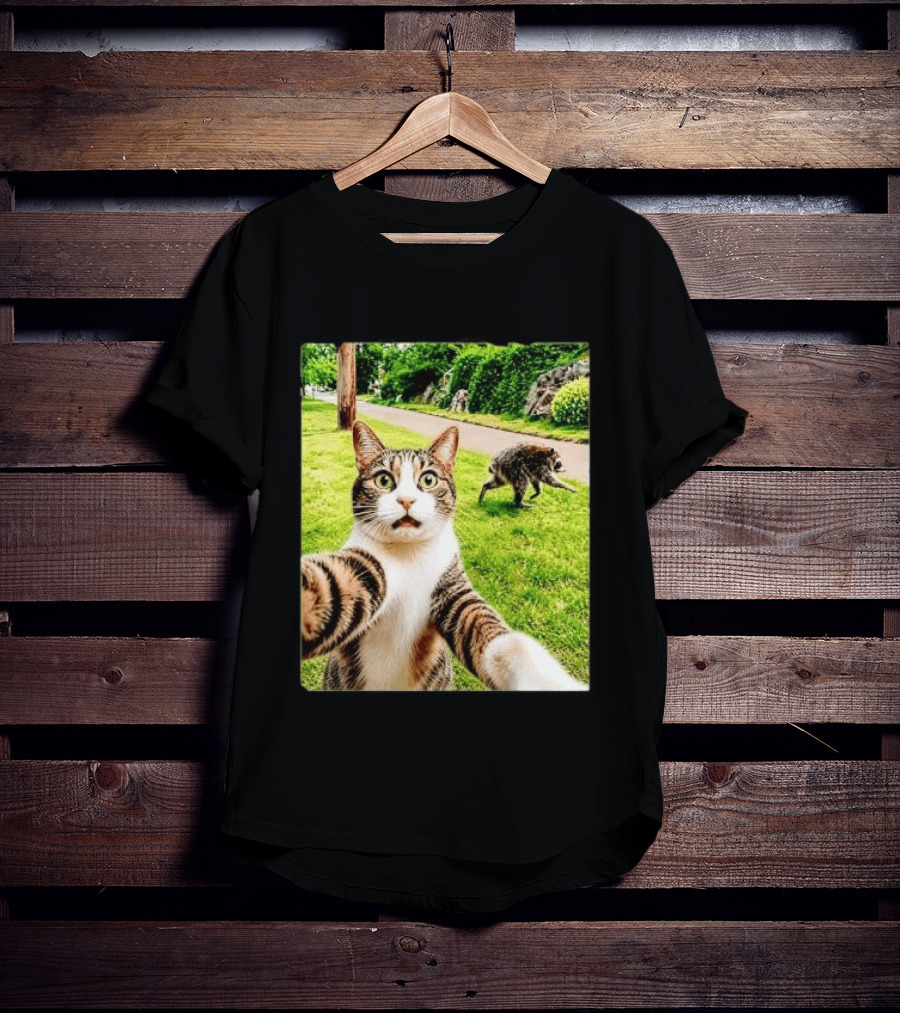 Shocked Face Tabby Cat Taking Selfie With Running Raccoon On Lawn Road T-Shirt