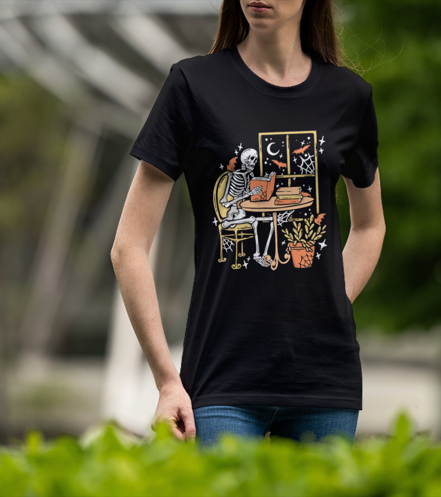 Cartoon Skeleton Reading Under Crescent Moon With Bats Orange Book Table Window T-Shirt