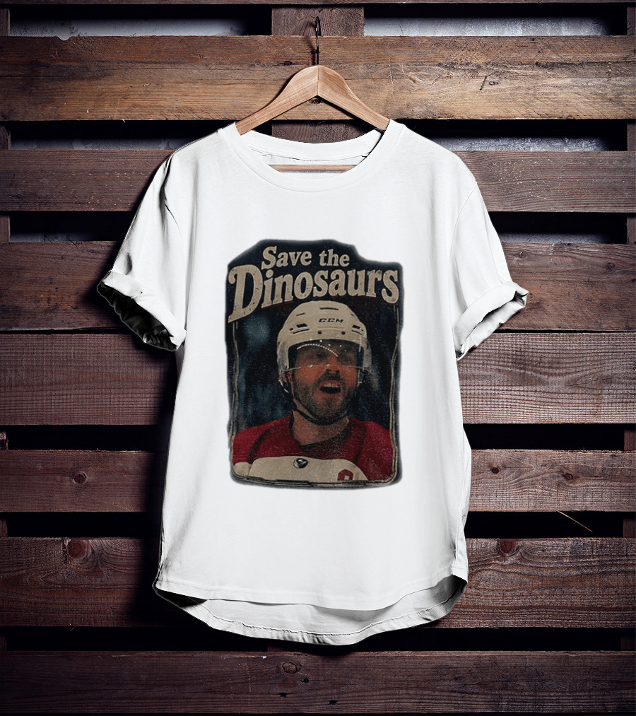 Connor Storrie Wearing Scott Hunter Save The Dinosaurs CCM Hockey T-Shirt