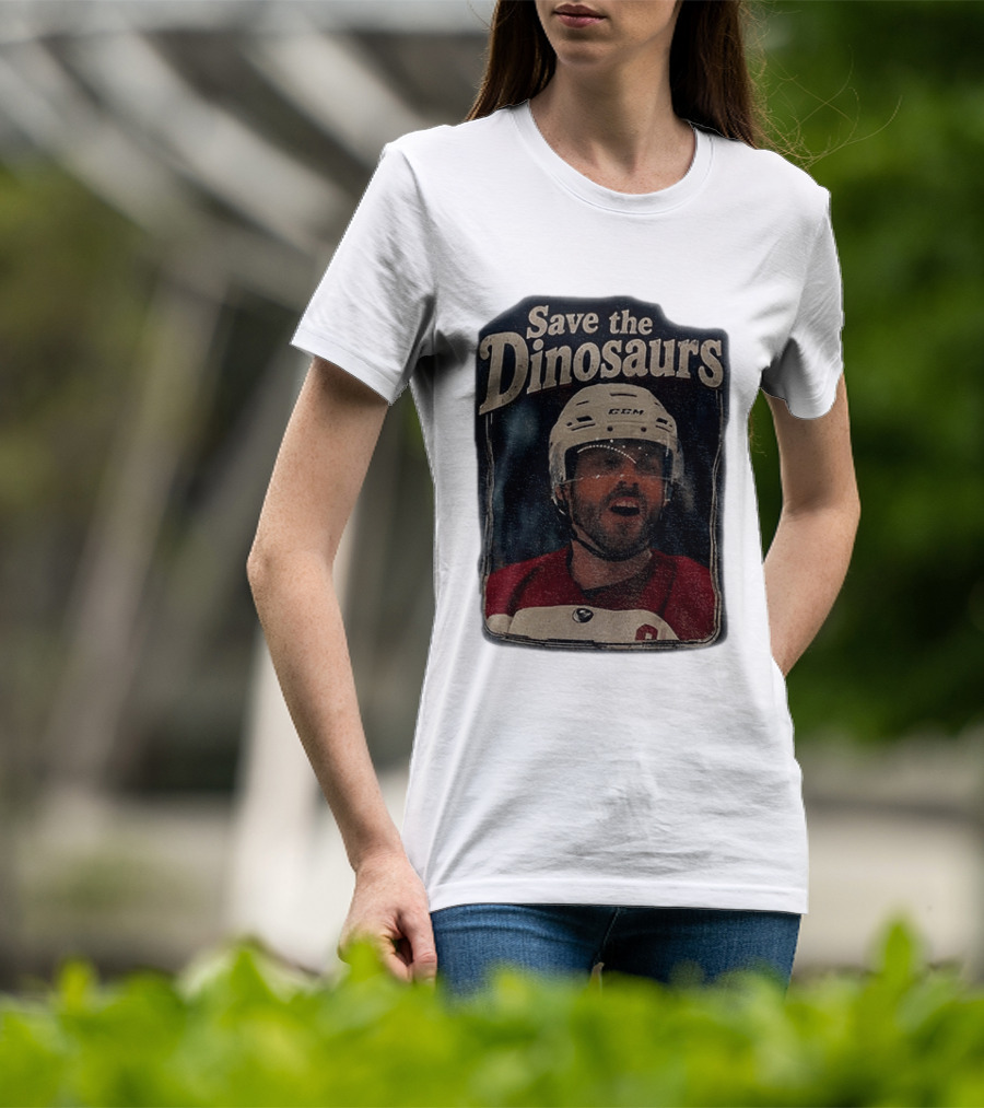 Connor Storrie Wearing Scott Hunter Save The Dinosaurs CCM Hockey T-Shirt
