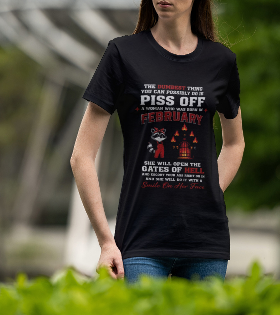 The Dumbest Thing You Can Possibly Do Is Piss Off A Woman Born In February Raccoon Gates Of Hell With A Smile On Her Face T-Shirt