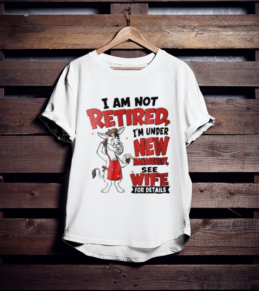 I Am Not Retired I'm Under New Management See Wife For Details Cartoon Donkey Red Apron T-Shirt