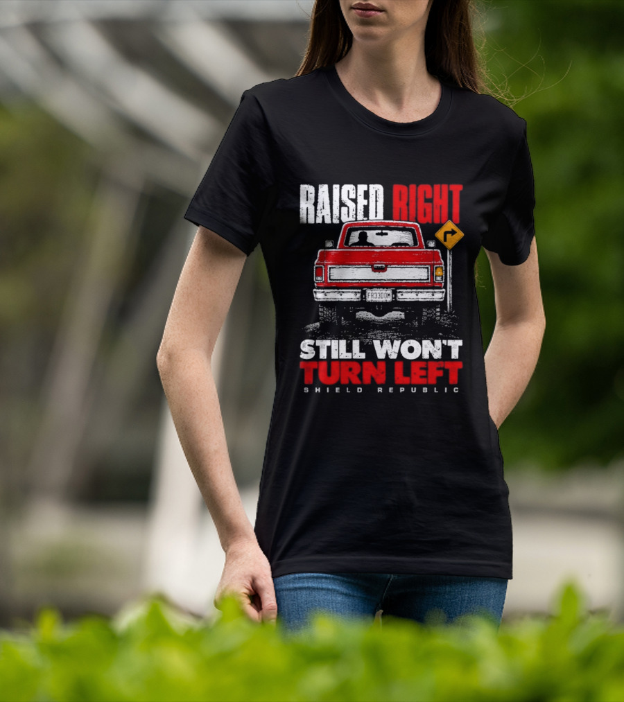 Raised Right Still Won't Turn Left Shield Republic Truck Back View With Right Turn Sign T-Shirt
