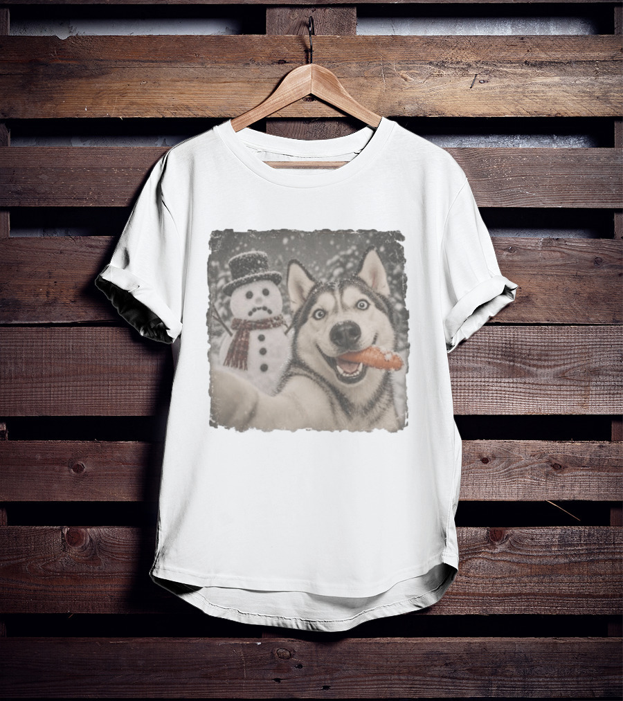 A Sled Dog With A Carrot And A Sad Snowman In A Snowy Winter Scene T-Shirt
