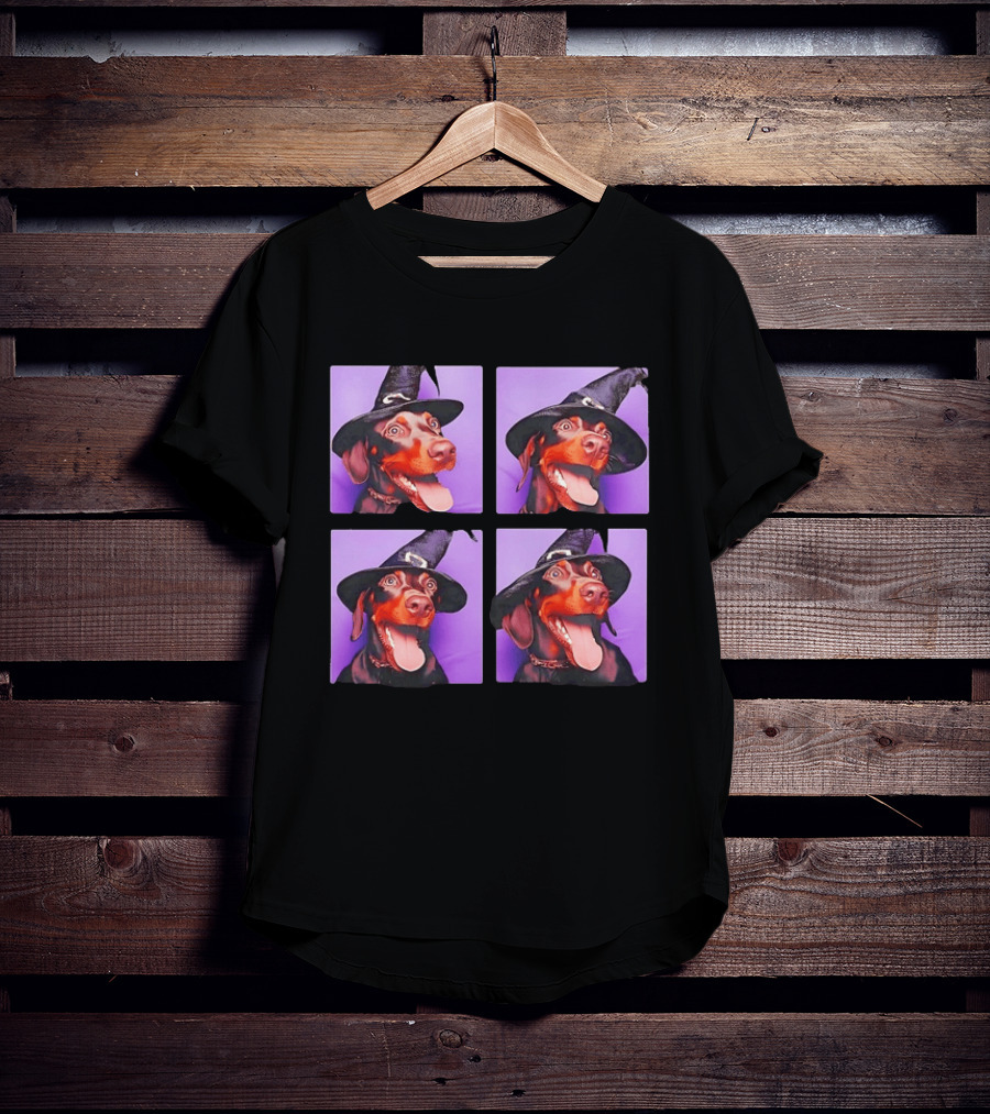 Doberman Pinscher In Witch Hat For Halloween With Purple T-Shirt